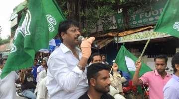 Former BJD MLA from Khurda district of Odisha Prashant Jagdev rides SUV on BJP workers