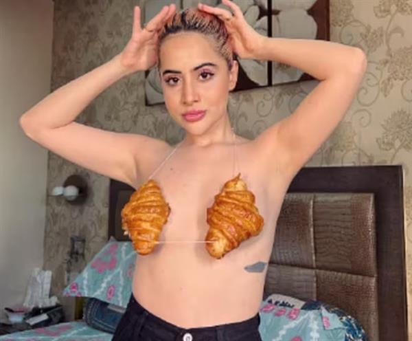 Urfi Javed employs croissants to cover her upper body; netizens express fatigue with the trend.